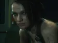 Jill Valentine z Resident Evil 3 Remake, brudna i poraniona, wygląda jak żywcem wyjęta z koszmaru. To właśnie **remaster co to** – odświeżona wersja klasyki.
